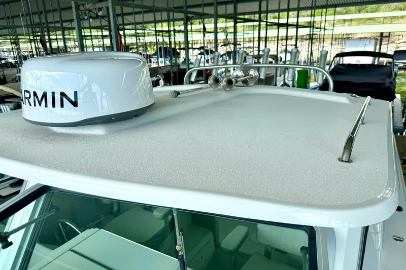 Slide: The Image of 2023 Parker 2820 XLD Sport Cabin with Garmin radar on the roof. - 39