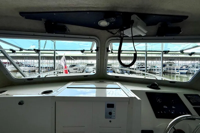 Slide: The Image of Interior view of 2023 Parker 2820 XLD Sport Cabin boat at marina. - 44