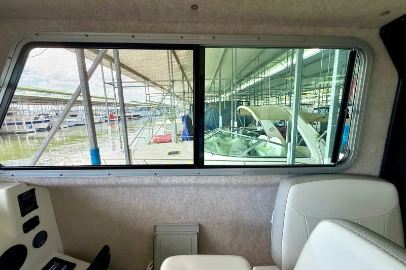 Slide: The Image of Interior view from 2023 Parker 2820 XLD Sport Cabin, overlooking marina through window. - 45