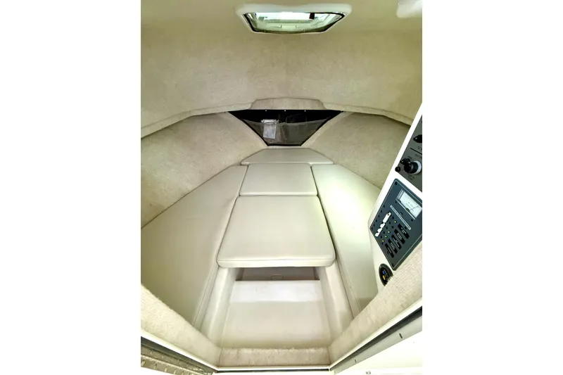 Slide: The Image of 2023 Parker 2820 XLD Sport Cabin interior with cushioned seating and control panel. - 49