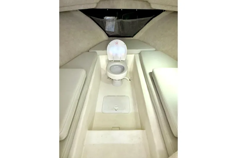 Slide: The Image of 2023 Parker 2820 XLD Sport Cabin interior with toilet and cushioned seating. - 50