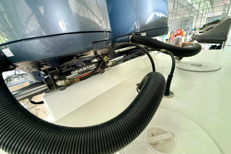 Slide: The Image of 2023 Parker 2820 XLD Sport Cabin boat with SeaStar hydraulic steering system. - 52