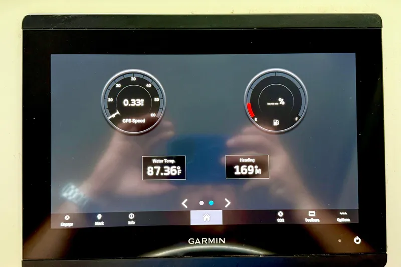 Slide: The Image of Garmin display on 2023 Parker 2820 XLD Sport Cabin showing GPS speed and water temperature. - 56
