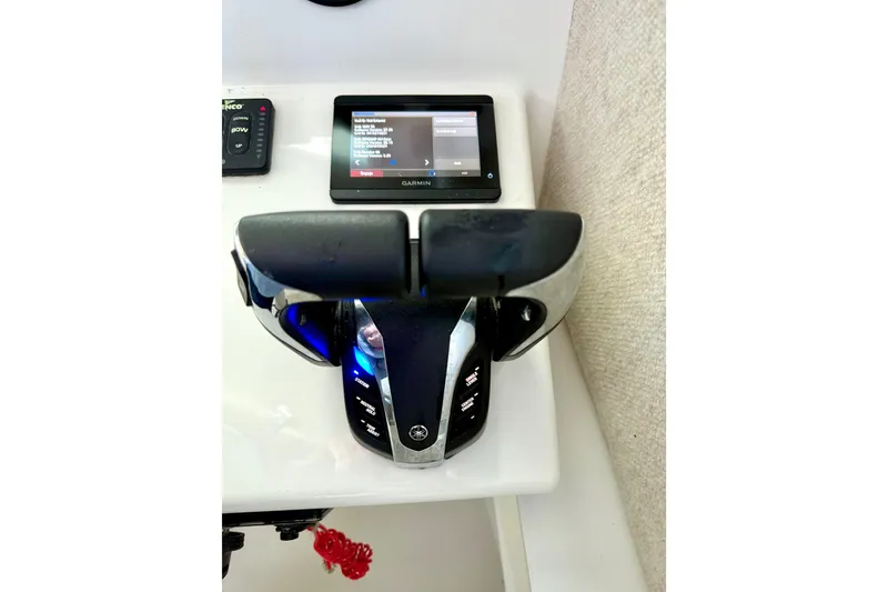 Slide: The Image of Control panel of 2023 Parker 2820 XLD Sport Cabin with Garmin display and throttle. - 59