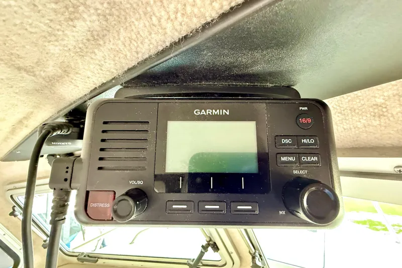 Slide: The Image of Garmin marine radio in 2023 Parker 2820 XLD Sport Cabin boat interior. - 60