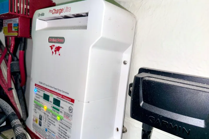 Slide: The Image of Sterling Power ProCharge Ultra and Garmin device in Parker 2820 XLD Sport Cabin, 2023. - 63