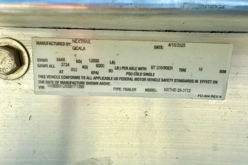 Slide: The Image of Label on Parker 2820 XLD Sport Cabin trailer, manufactured by Nextrail, dated 4/18/2025. - 77
