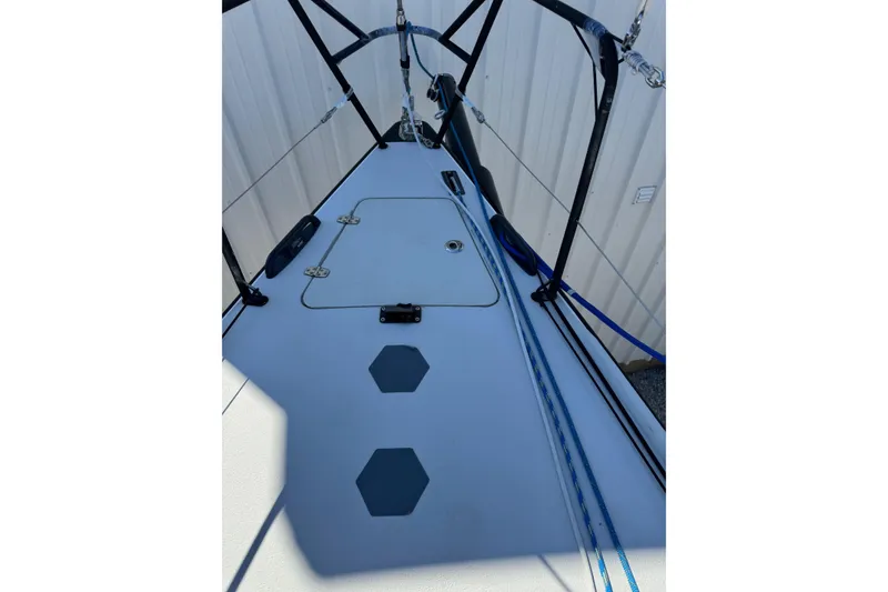 Slide: The Image of 2019 J Boats J/121 deck with rigging and hatch, showcasing sleek design. - 22
