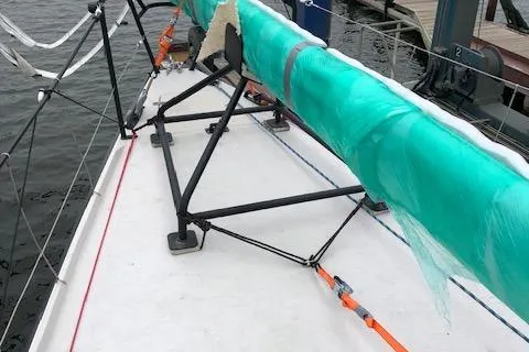 Slide: The Image of 2019 J Boats J/121 sailboat deck with wrapped mast and rigging. - 36