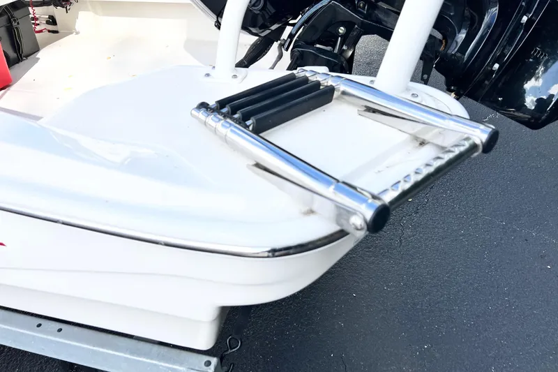 Slide: The Image of 2021 Boston Whaler 160 Super Sport boat with stainless steel swim ladder. - 3
