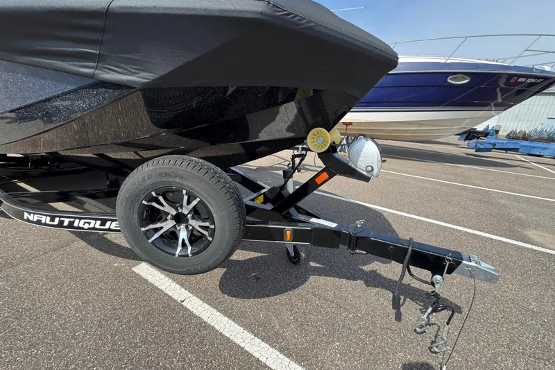 Slide: The Image of 2020 Nautique Super Air Nautique GS22 interior with luxurious seating and sleek design. - 11