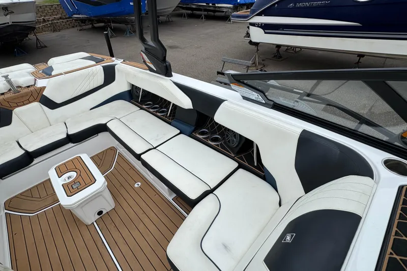 Slide: The Image of 2020 Nautique Super Air Nautique GS22 dashboard with steering wheel and control panel. - 20