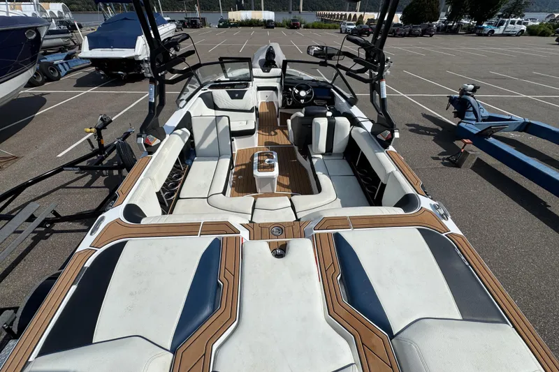Slide: The Image of 2020 Nautique Super Air Nautique GS22 boat interior with sleek seating and modern design. - 24