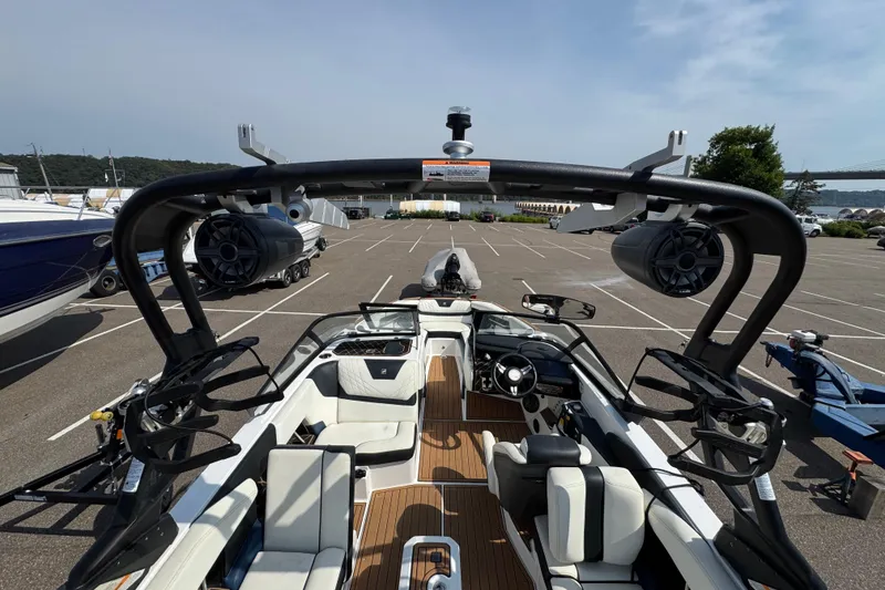 Slide: The Image of 2020 Nautique Super Air Nautique GS22 interior with sleek seating and modern design. - 26