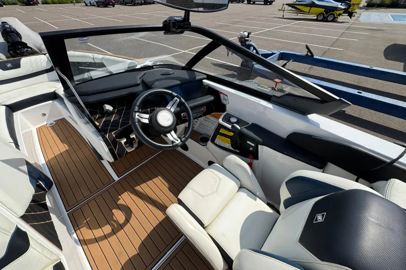 Slide: The Image of 2020 Nautique Super Air Nautique GS22 interior speaker and cup holders detail. - 30
