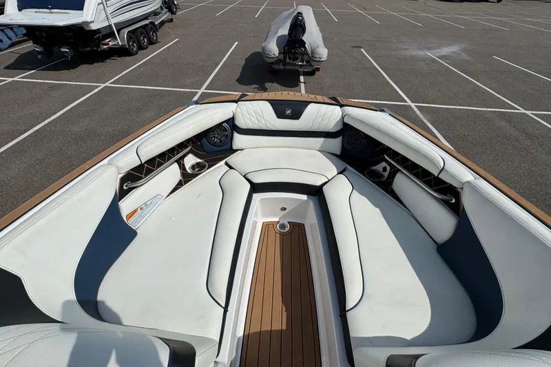 Slide: The Image of Storage compartment of 2020 Nautique Super Air Nautique GS22 boat, featuring interior details. - 33