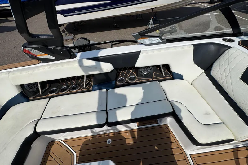 Slide: The Image of 2020 Nautique Super Air Nautique GS22 boat with sleek interior and advanced sound system. - 38