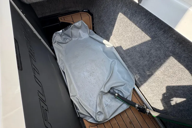 Slide: The Image of 2020 Nautique Super Air Nautique GS22 on trailer, covered and parked. - 42