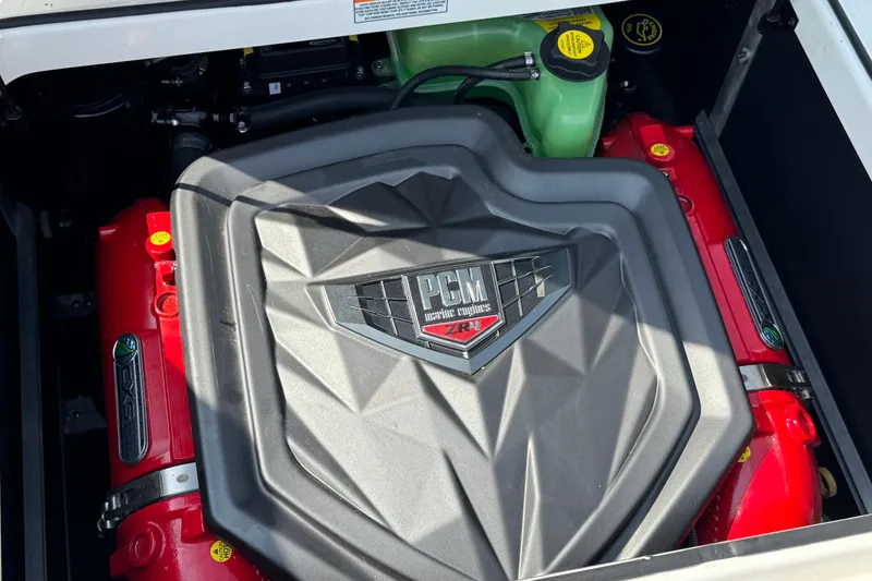 Slide: The Image of 2020 Nautique Super Air Nautique GS22 boat on trailer in marina parking lot. - 45