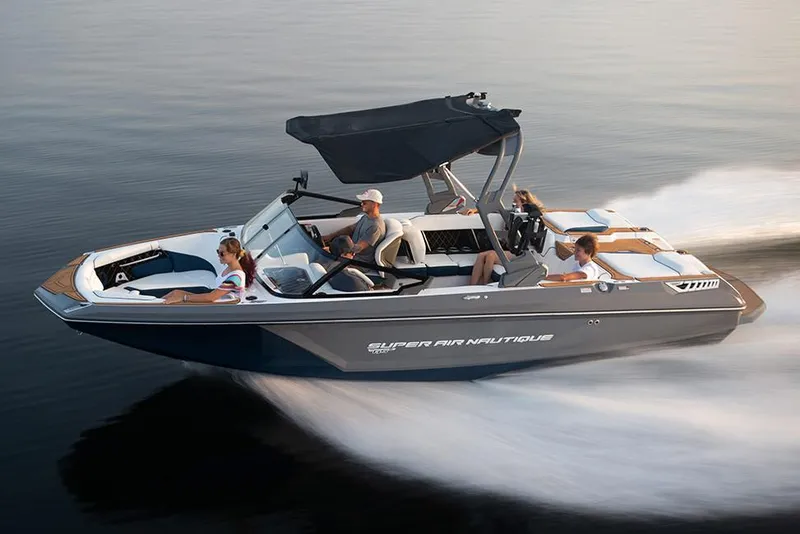 Slide: The Image of Manufacturer Provided Image: 2020 Nautique Super Air Nautique GS22 boat speeding on water with passengers. - 47