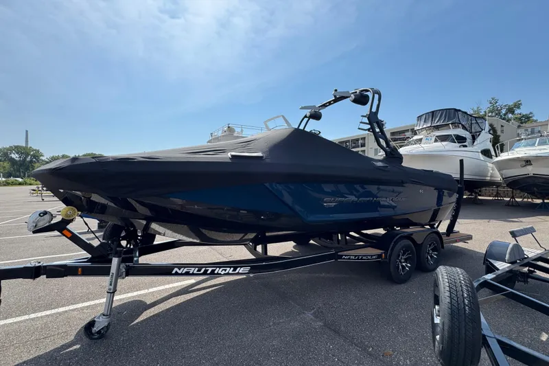 Slide: The Image of 2020 Nautique Super Air Nautique GS22 on trailer, rear view, parked outdoors. - 6