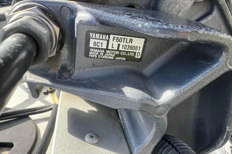 Slide: The Image of Close-up of Yamaha F50TLR motor on 2011 Alumacraft Classic 165 CS boat. - 6