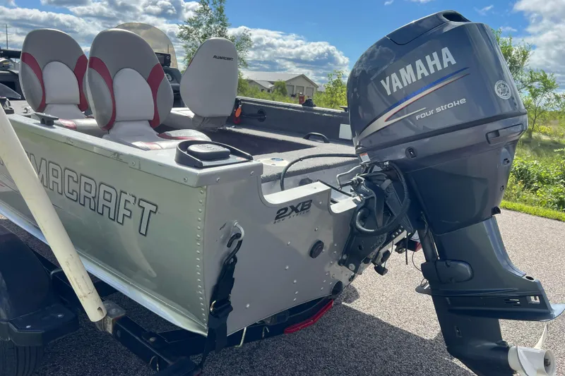 Slide: The Image of 2011 Alumacraft Classic 165 CS boat with Yamaha four-stroke outboard motor. - 7