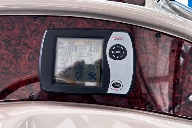 Slide: The Image of Dashboard of 2004 Sea Ray 460 Sundancer with digital display and controls. - 23