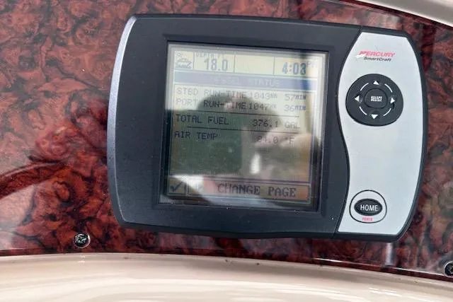 Slide: The Image of Display panel on 2004 Sea Ray 460 Sundancer showing fuel and engine data. - 24