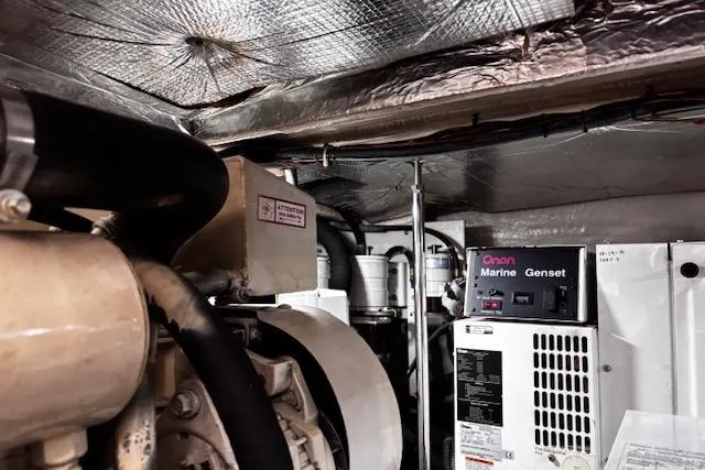 Slide: The Image of Engine room of 2004 Sea Ray 460 Sundancer with Onan Marine Genset. - 43