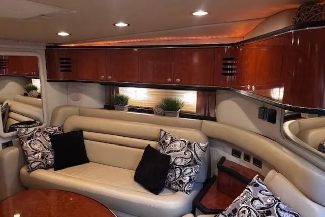 Slide: The Image of Luxurious interior of 2004 Sea Ray 460 Sundancer yacht with elegant seating and decor. - 57