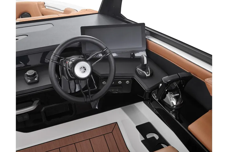 Slide: The Image of 2026 Yamaha Boats 295XD helm with steering wheel, touchscreen, and controls. - 10