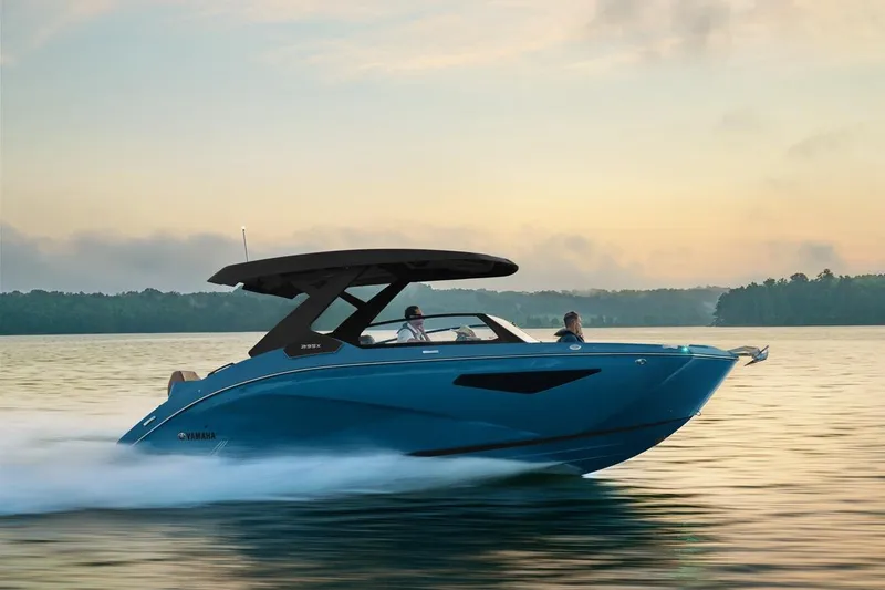 Slide: The Image of 2026 Yamaha Boats 295XD dashboard with digital display and steering wheel. - 7