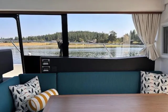 Slide: The Image of Interior of 2019 Jeanneau Velasco 37F yacht with scenic water view. - 17