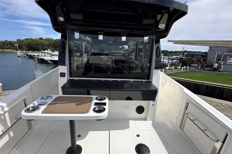 Slide: The Image of Interior view of 2025 Navan C30 boat, showcasing sleek seating and modern design elements. - 13