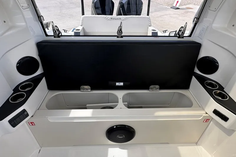 Slide: The Image of 2026 Navan C30 boat with sleek design and spacious deck under cloudy sky. - 18