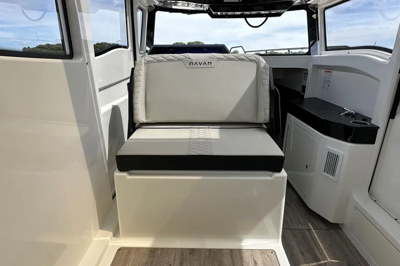 Slide: The Image of 2026 Navan C30 boat interior with open hatch, showcasing sleek design and modern features. - 19