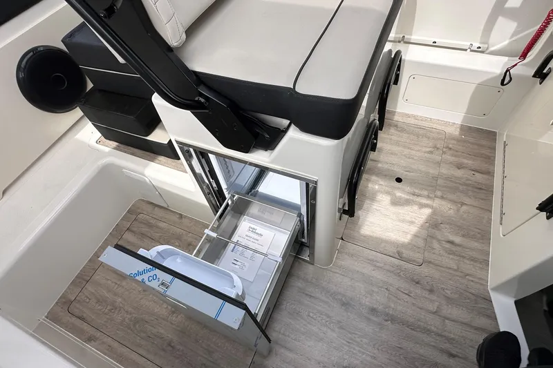 Slide: The Image of 2026 Navan C30 boat interior with convertible seating and modern controls. - 24