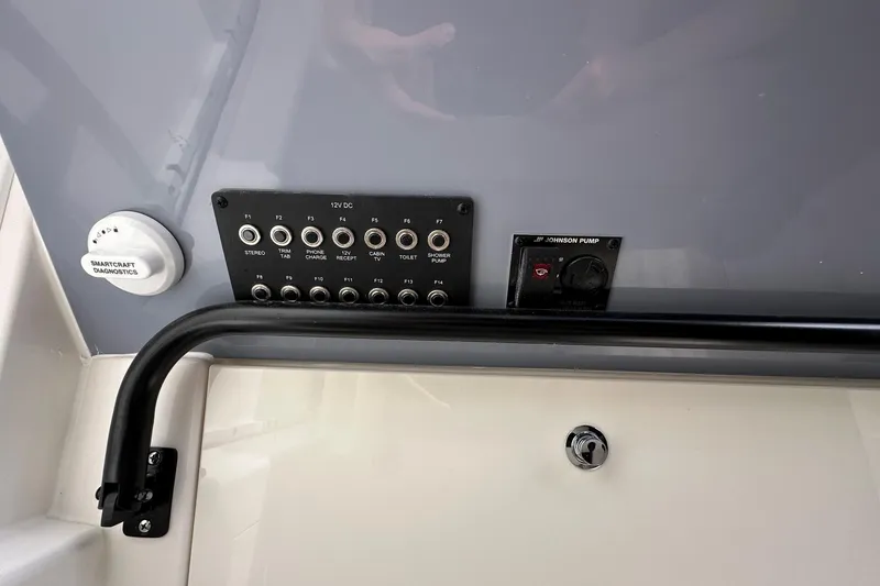 Slide: The Image of Interior of 2025 Navan C30 boat with cushioned seating and modern design. - 26