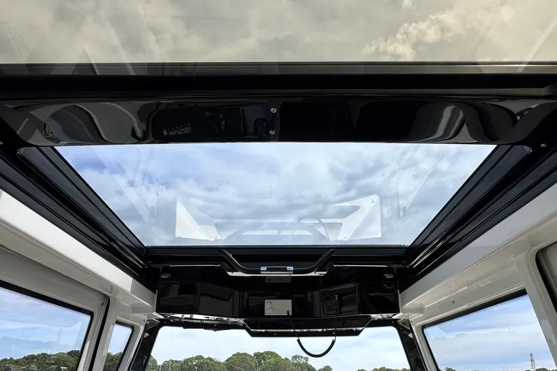 Slide: The Image of Interior view of Navan C30 2025 model, showcasing plumbing and electrical components. - 30