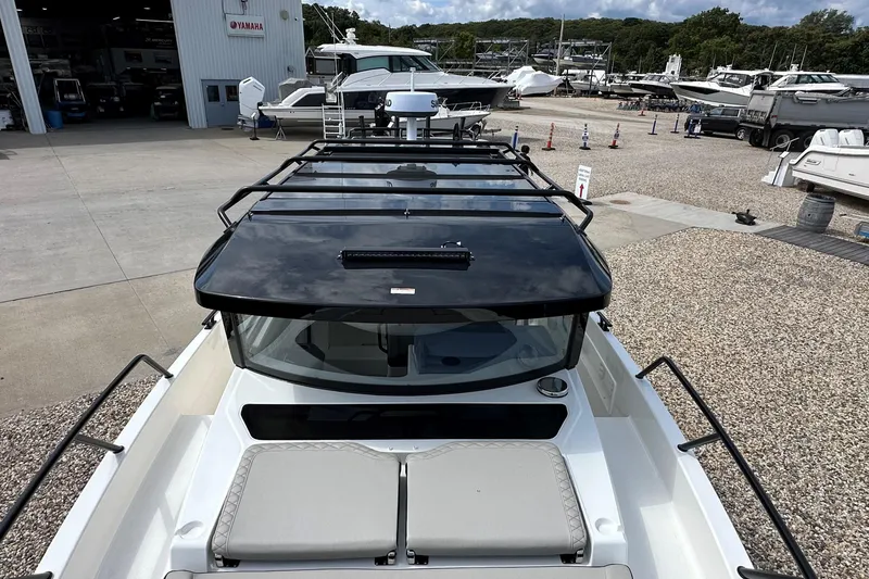 Slide: The Image of 2025 Navan C30 boat at marina, showcasing sleek design and modern features. - 47