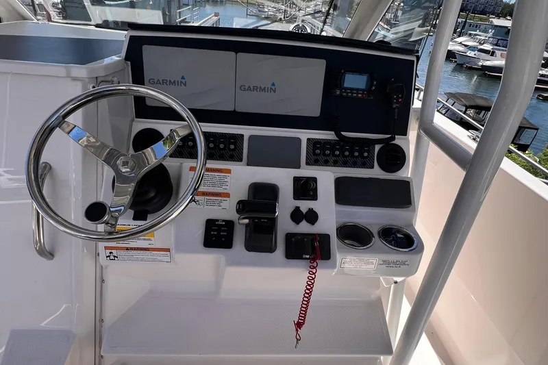 Slide: The Image of Helm of 2021 Cutwater C-24 CW boat with Garmin navigation system. - 16