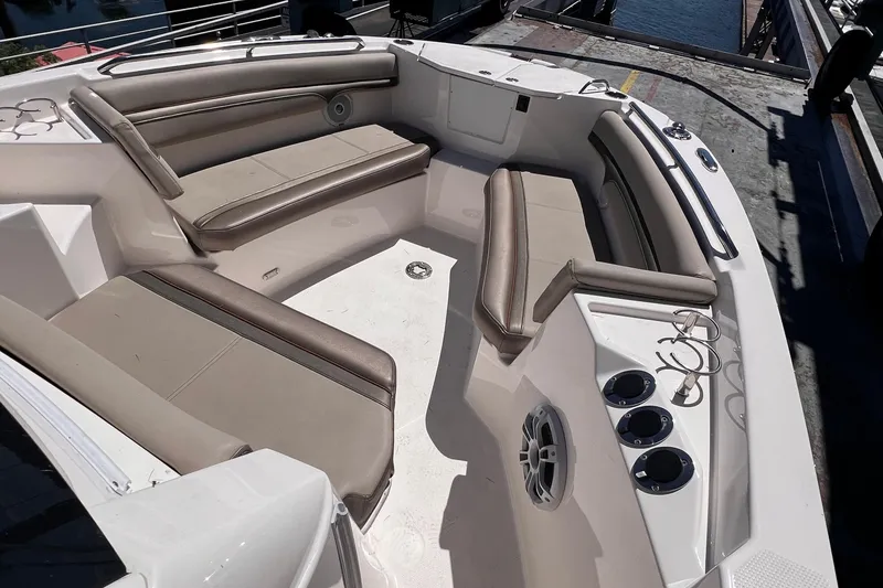 Slide: The Image of 2021 Cutwater C-24 CW boat interior with cushioned seating and cup holders. - 18