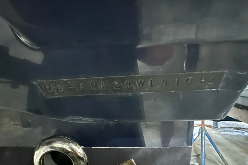 Slide: The Image of 2021 Cutwater C-24 CW boat hull with visible identification number. - 8