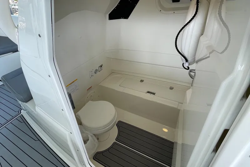 Slide: The Image of 2022 Brig Eagle 8 boat interior with compact bathroom and modern amenities. - 13