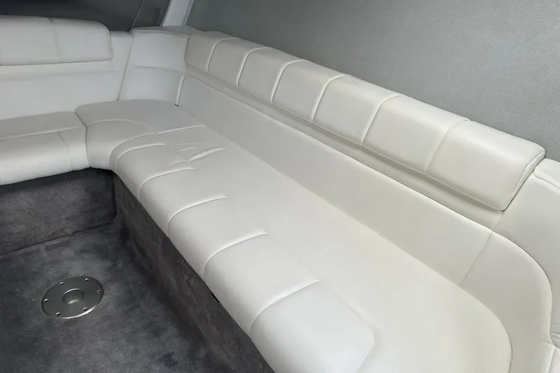 Slide: The Image of Interior of 1998 Formula 353 FASTech boat with white leather seating. - 23