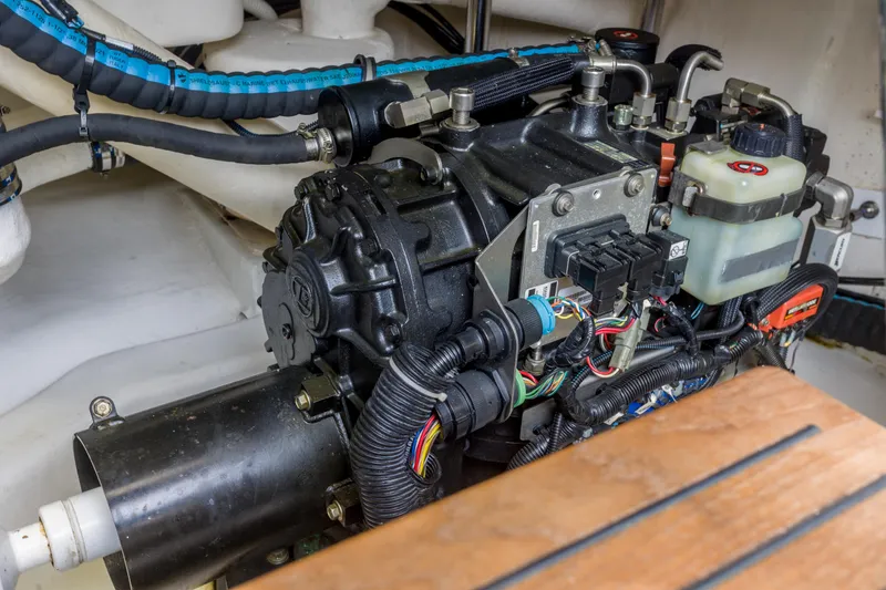 Slide: The Image of Engine compartment of 2012 Grand Banks 46 Eastbay SX, showcasing detailed mechanical components. - 26