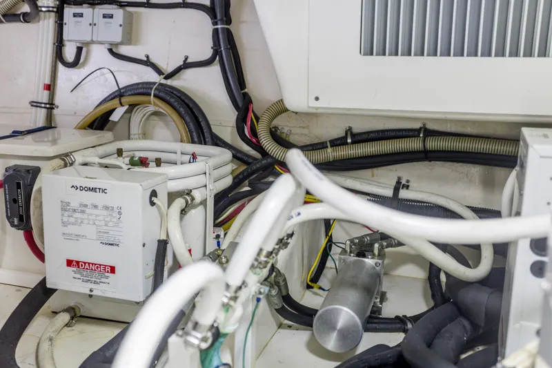Slide: The Image of Engine room of 2012 Grand Banks 46 Eastbay SX with Dometic equipment and wiring. - 31