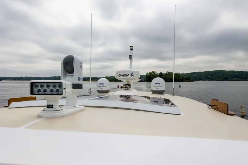 Slide: The Image of 2012 Grand Banks 46 Eastbay SX yacht with advanced navigation equipment on deck. - 32