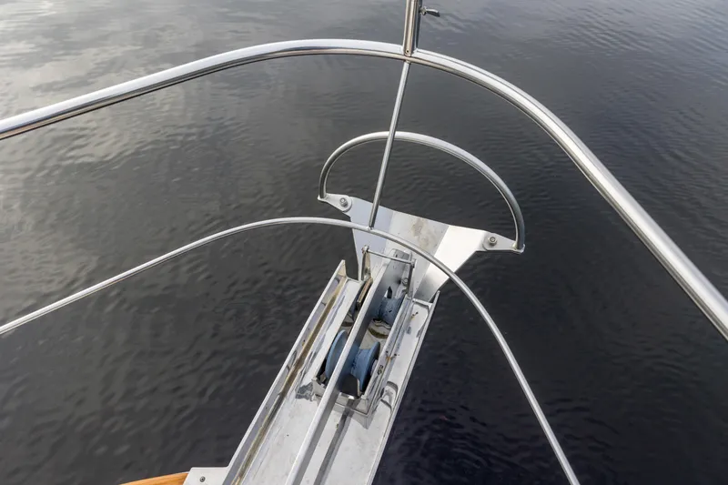 Slide: The Image of Bow view of 2012 Grand Banks 46 Eastbay SX yacht on calm water. - 36